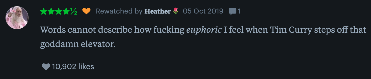 Comment expressing excitement about Tim Curry stepping off an elevator, with 10,902 likes