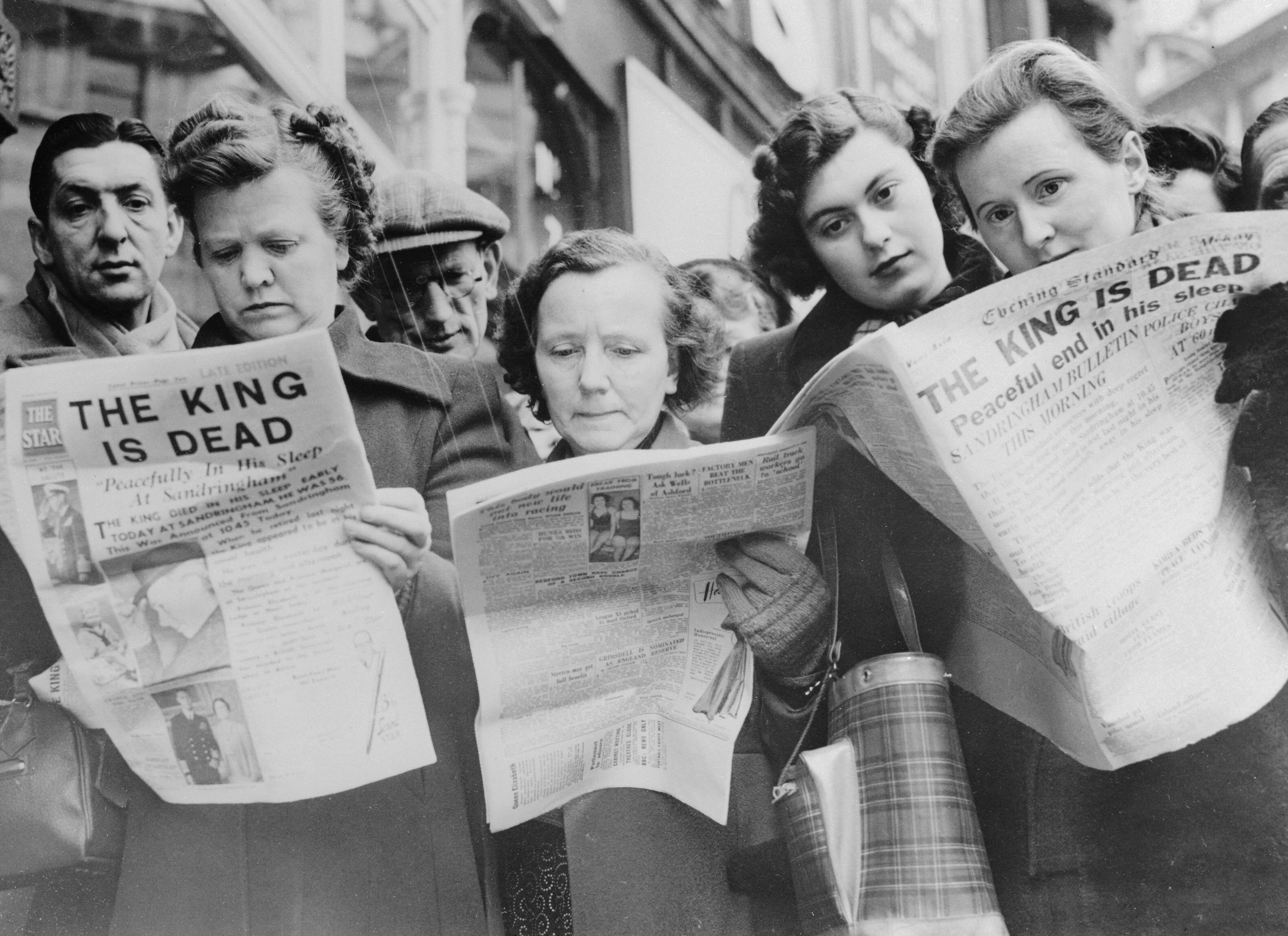 People reading newspapers with the headline "The King is Dead," announcing the passing of a monarch