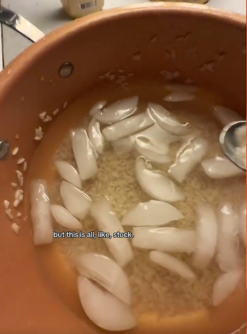 Rice is soaking with ice cubes in a copper pot. Text reads, "but this is all, like, stuck."