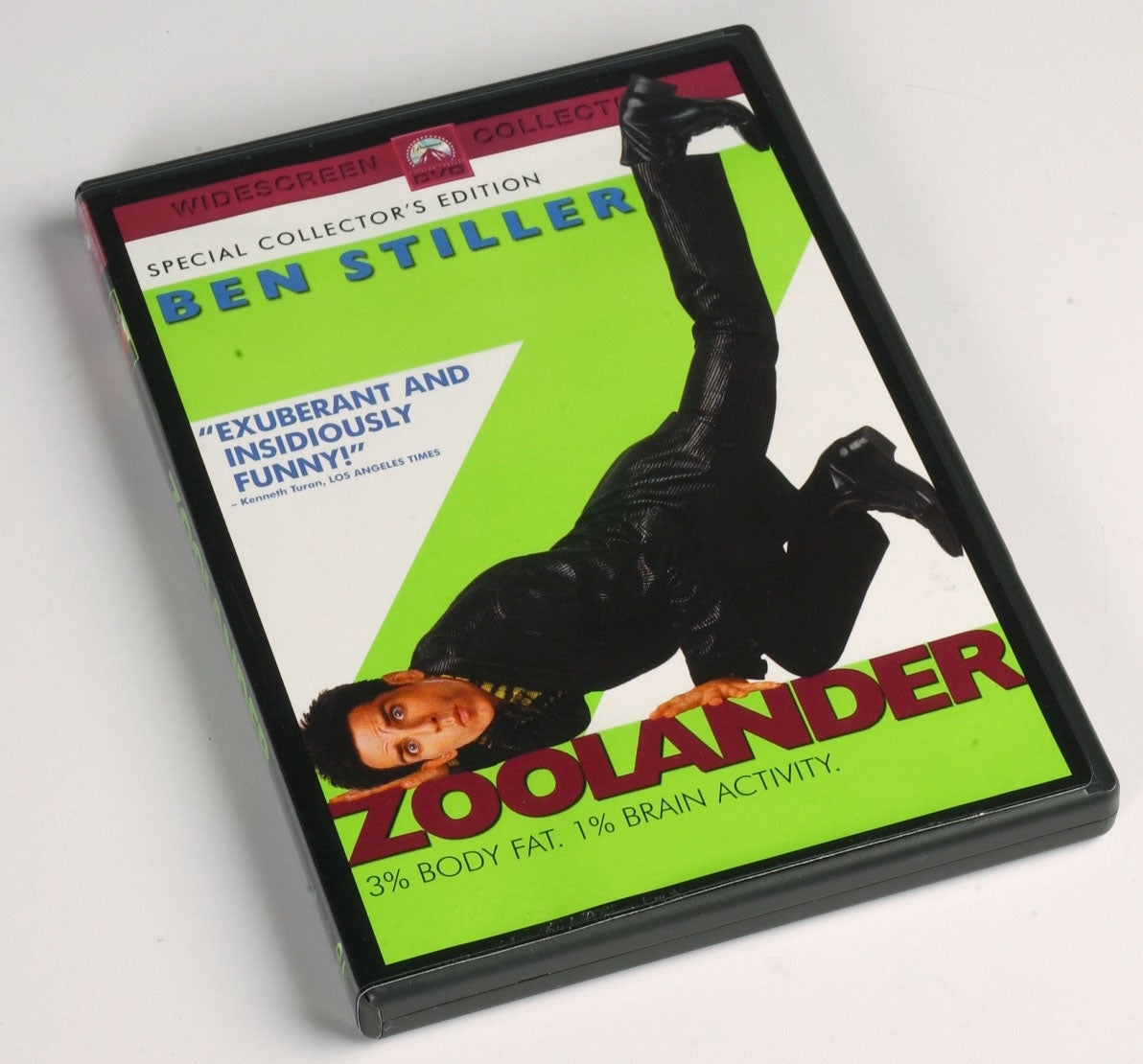DVD cover of "Zoolander" featuring Ben Stiller in a pose. Text includes "Exuberant and insidiously funny!" and "3% body fat. 1% brain activity."
