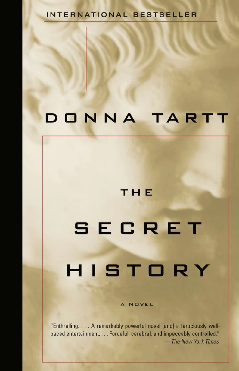 Cover of "The Secret History" by Donna Tartt, an international bestseller. Review quote from The New York Times praising the novel's impact