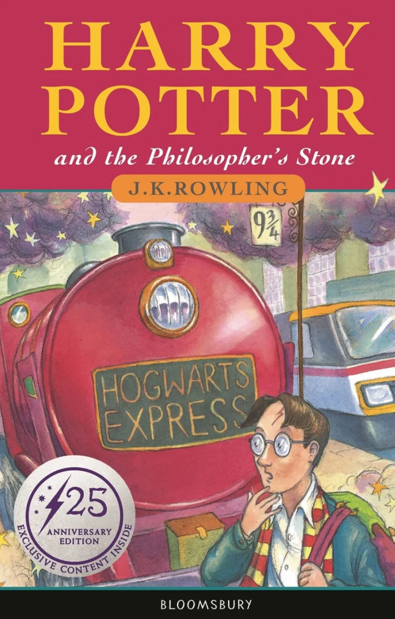 Book cover of "Harry Potter and the Philosopher's Stone" showing a train with "Hogwarts Express" and a boy with glasses. 125th Anniversary Edition
