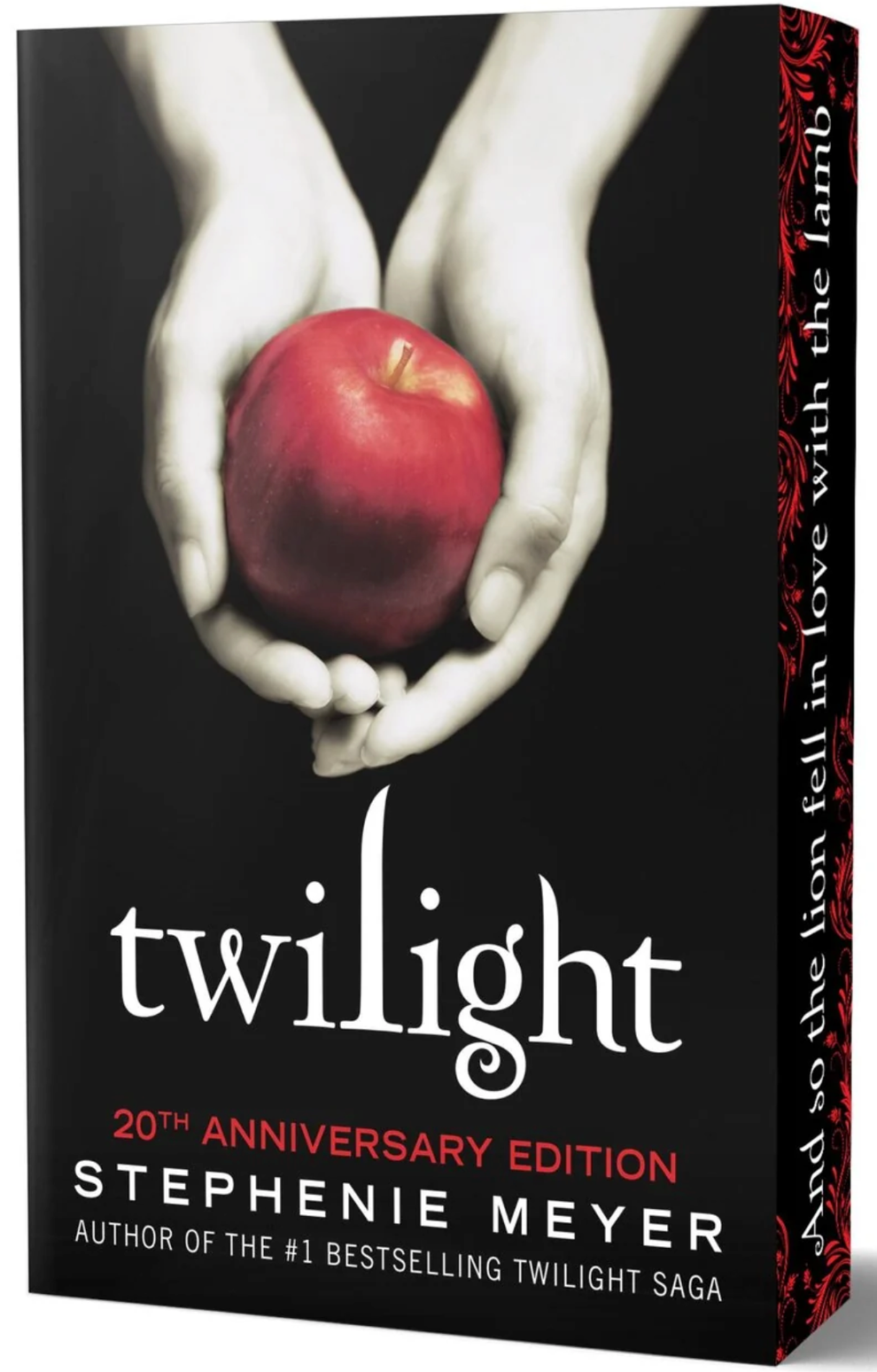 Book cover of "Twilight: 20th Anniversary Edition" by Stephenie Meyer, featuring hands holding an apple