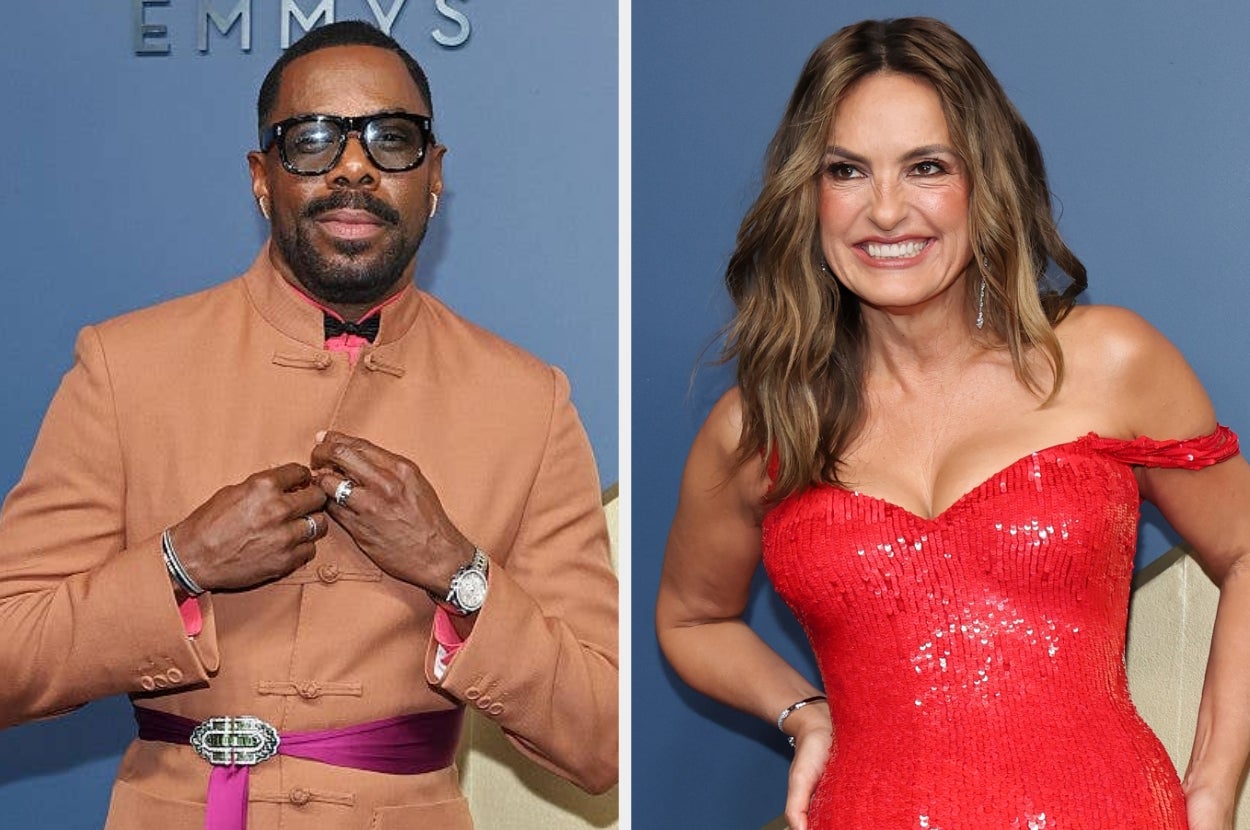 Man in a tailored suit with glasses and a woman in a sparkling strapless dress at a celebrity event