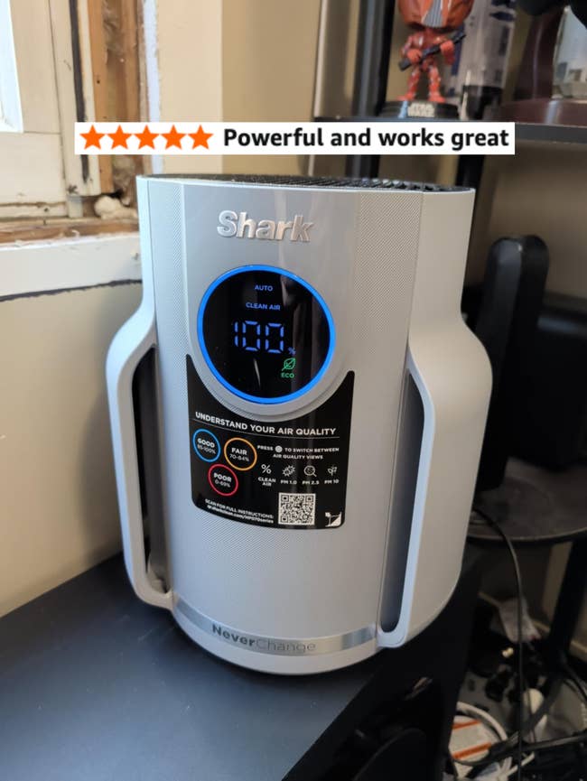 Shark aerial purifier successful a location mounting with a integer show showing existent aerial prime and car mode