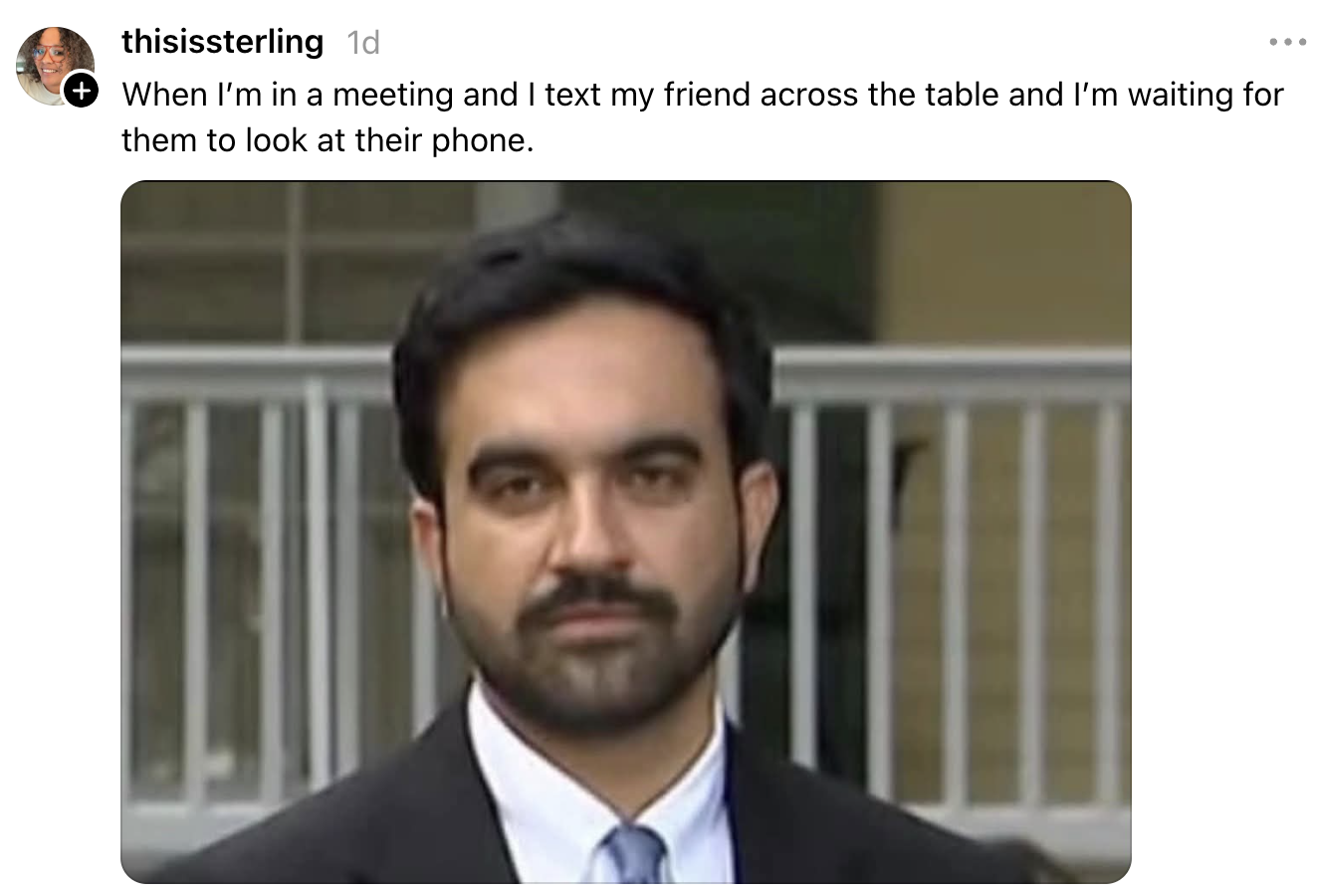 Man with a neutral expression looks forward. Caption compares this look to waiting for a friend to check a text during a meeting
