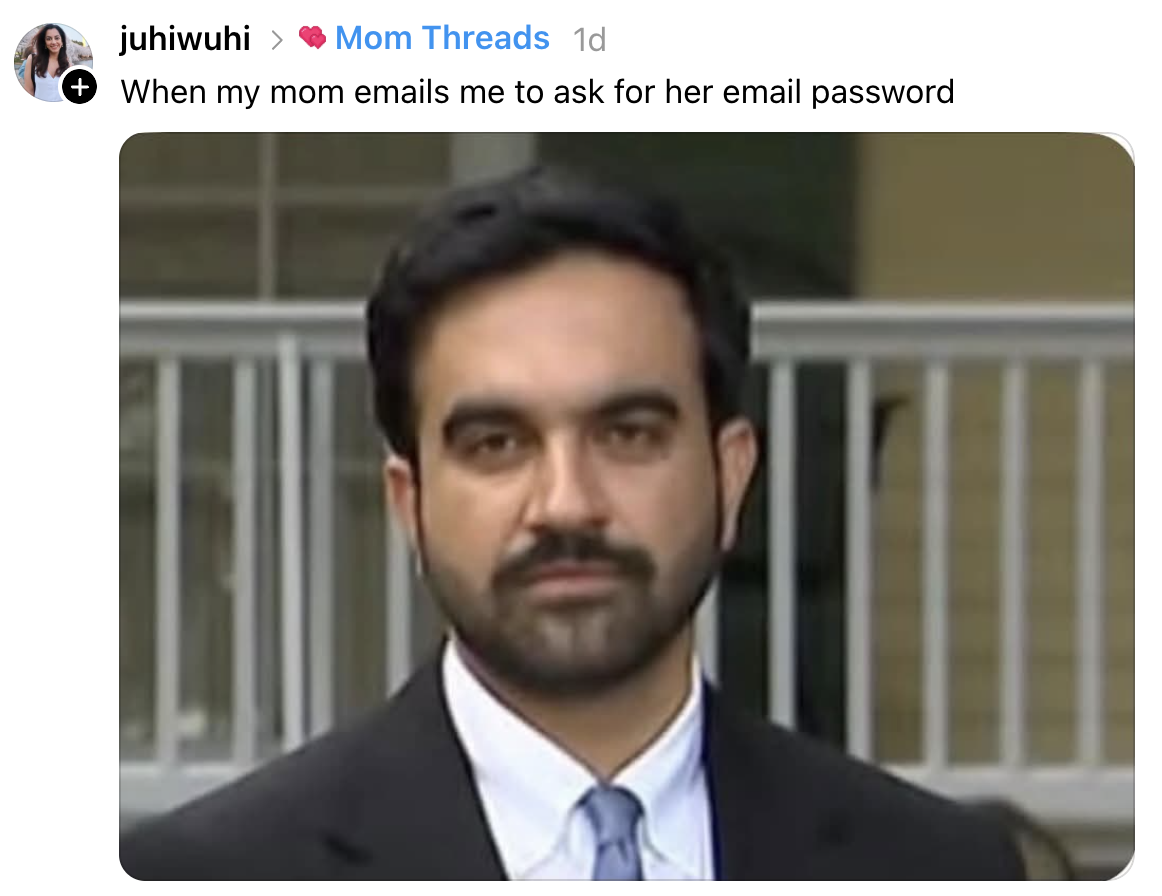 Man in suit with a serious expression, representing a humorous reaction to being asked for a password by a parent. Caption: When my mom emails me to ask for her email password