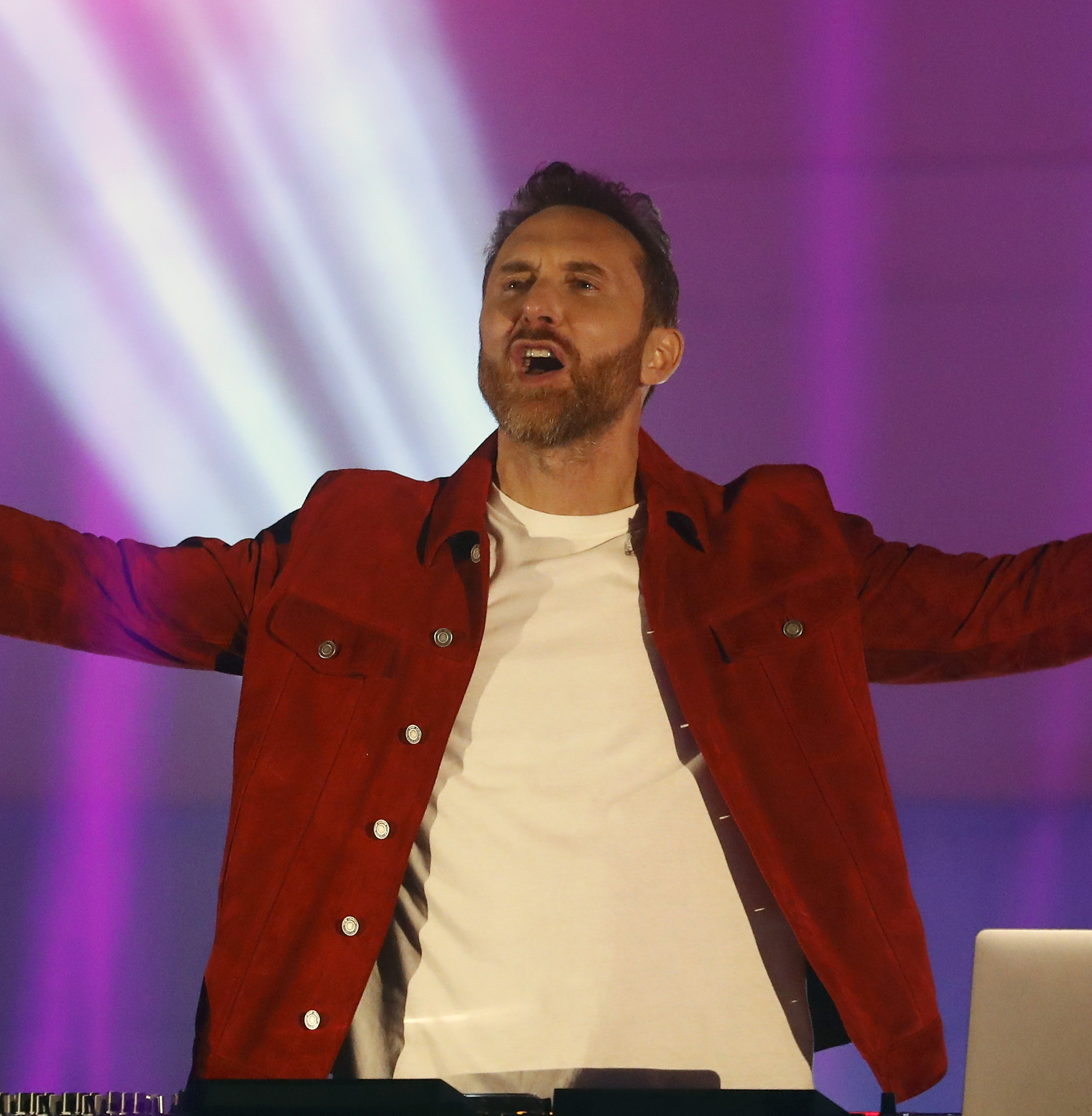 David performs energetically on stage