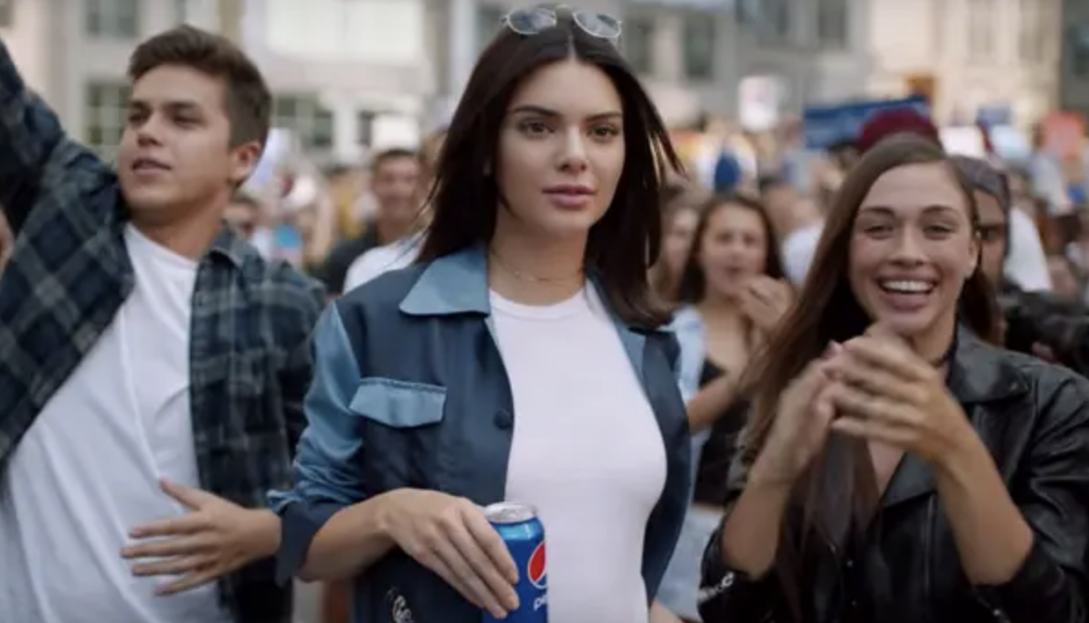 Kendall Jenner holding a Pepsi can