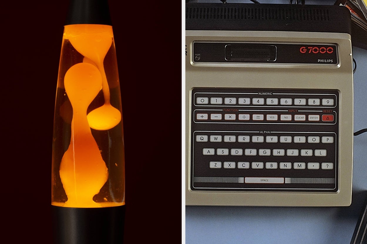 A lava lamp with flowing shapes next to a vintage G7000 gaming console with a built-in keyboard