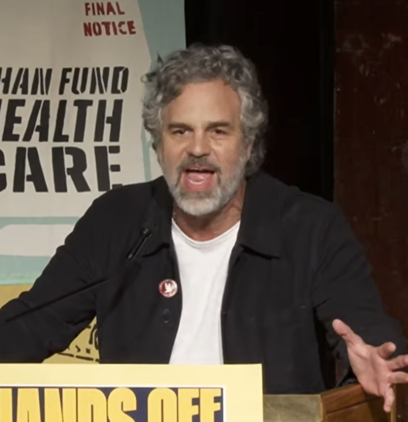 Mark Ruffalo speaks passionately at a podium