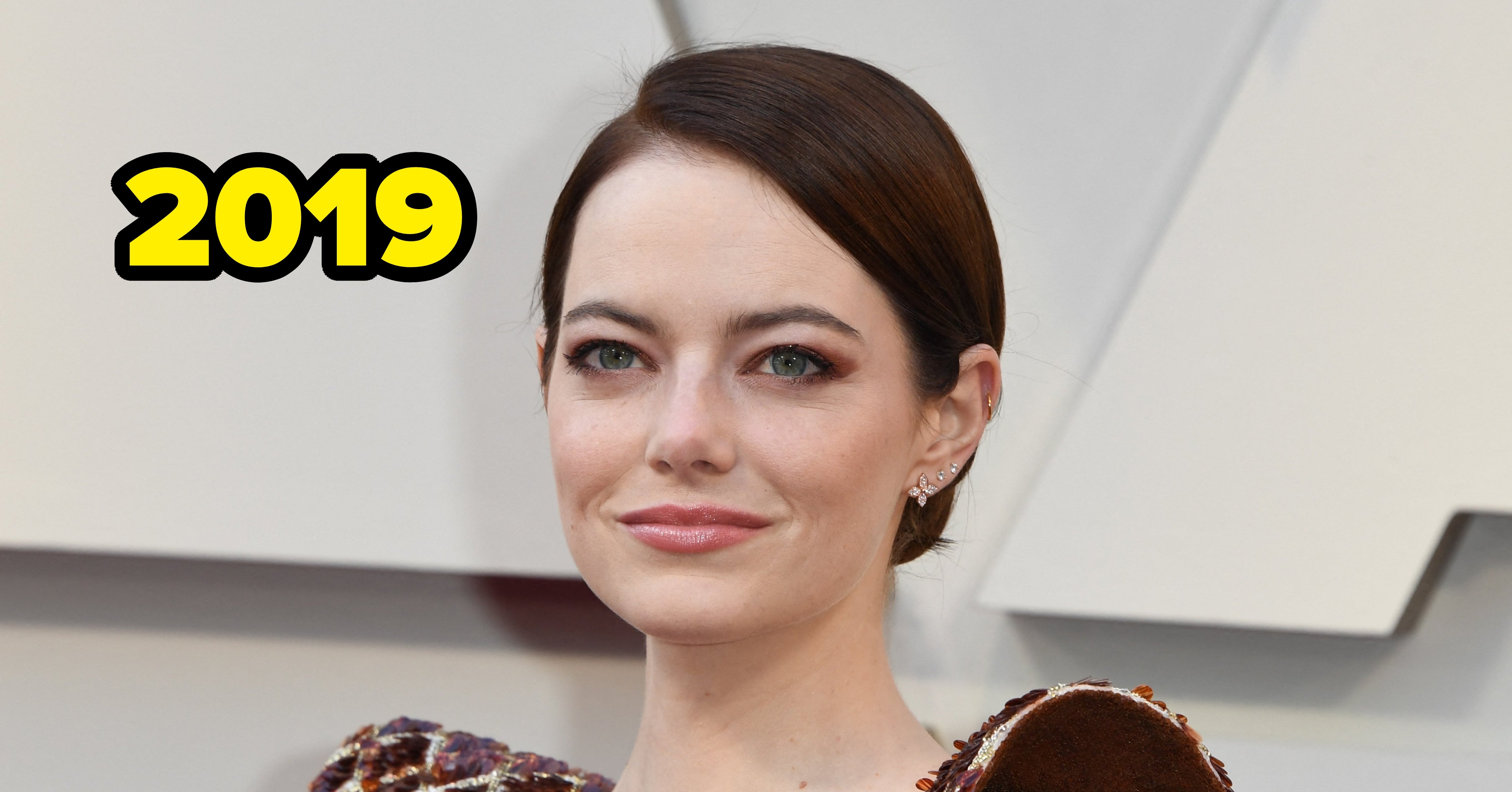 Emma Stone Is Once Again Being Accused Of Having A “Whole New Face” Thanks To These “Uncanny” Pics From Paris Fashion Week
