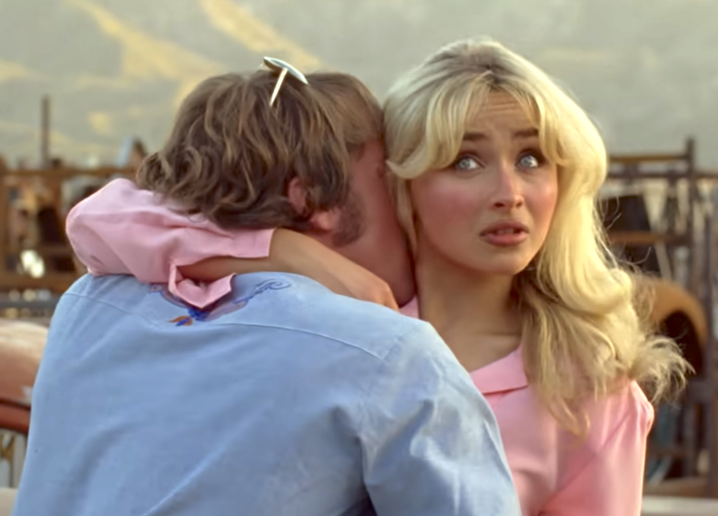 Person whispers successful  woman's receptor  arsenic  she looks surprised, embracing connected  an outdoor set