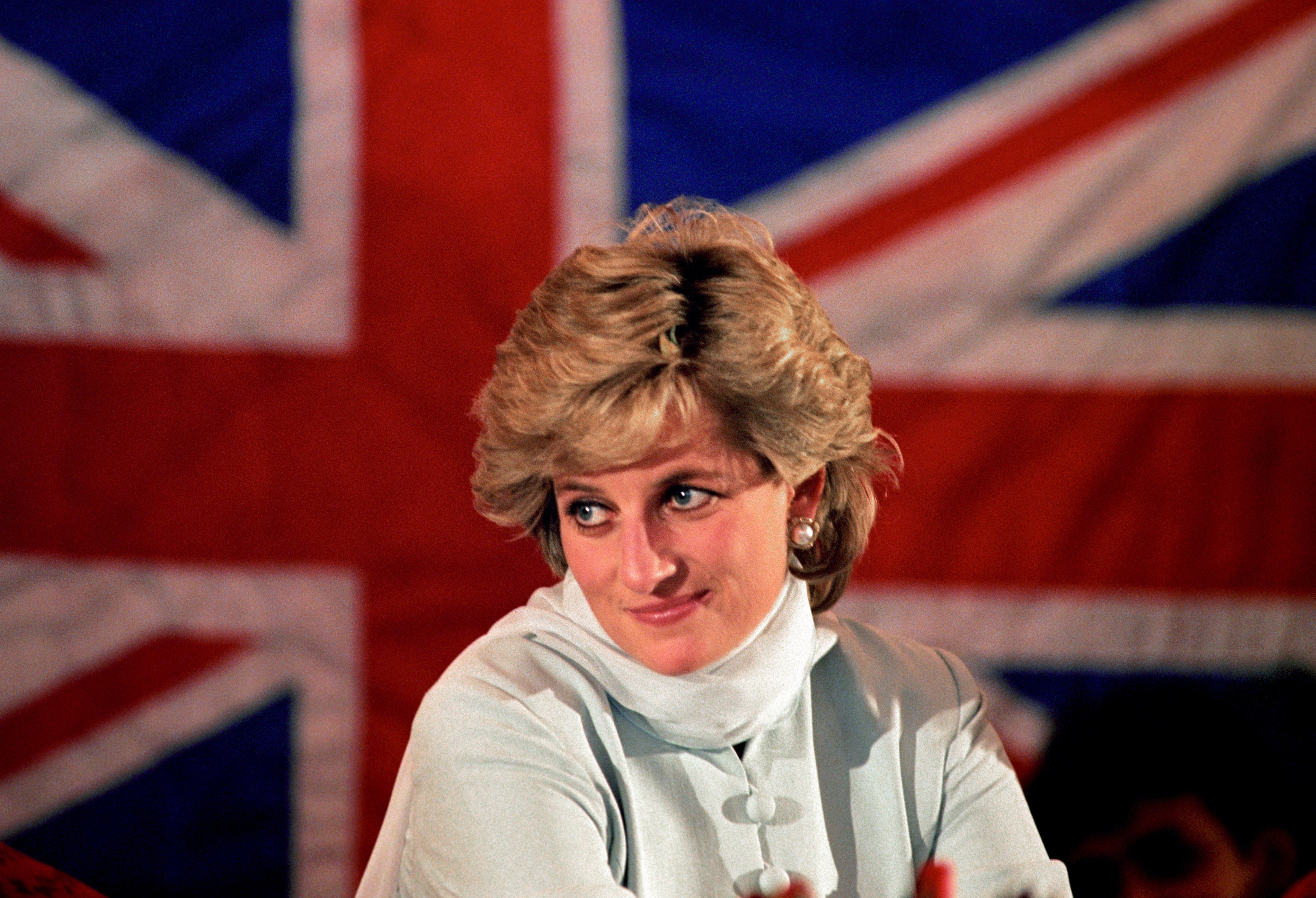Princess Diana in front of the Union Jack flag