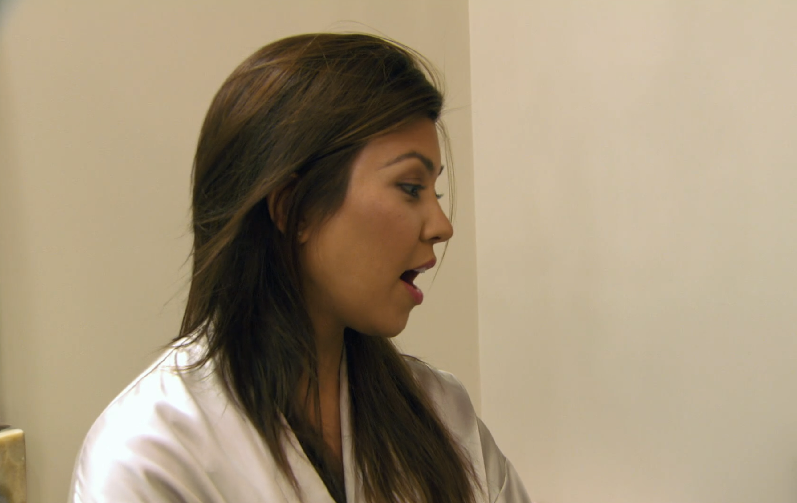 Kourtney speaking in a TV clip