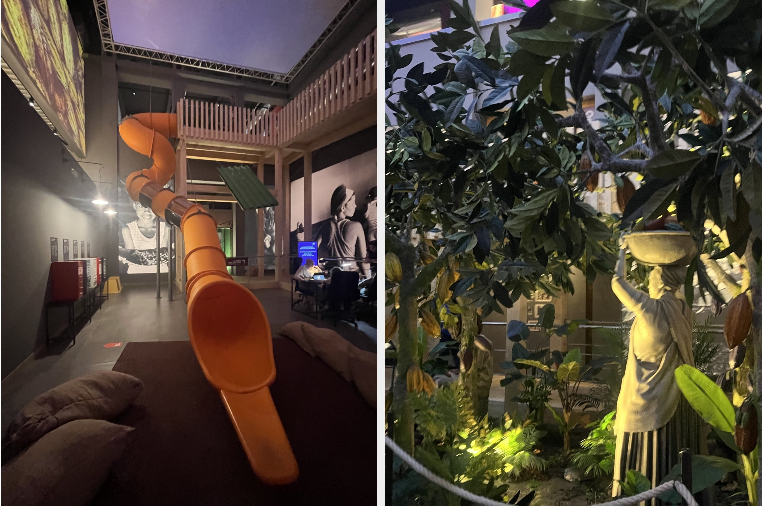 Indoor museum exhibit with a twisty slide and lush jungle-themed section featuring a statue of a person carrying a pot