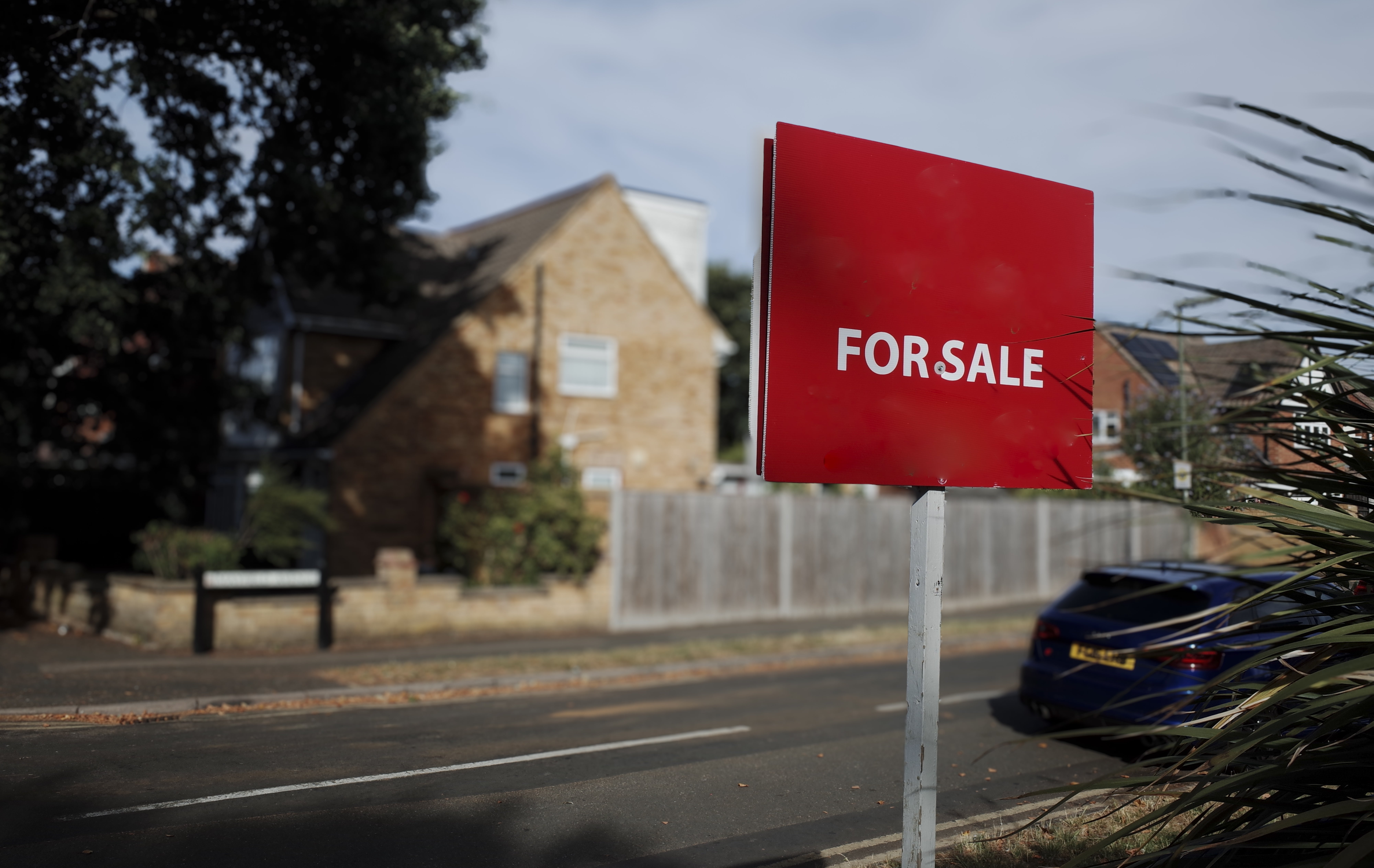 "For Sale" motion successful beforehand of a location connected a quiescent street, conveying existent property availability