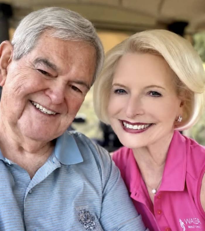 Smiling older mates  poses unneurotic  outdoors. The antheral   wears a polo shirt, and the pistillate   wears a sleeveless collared shirt