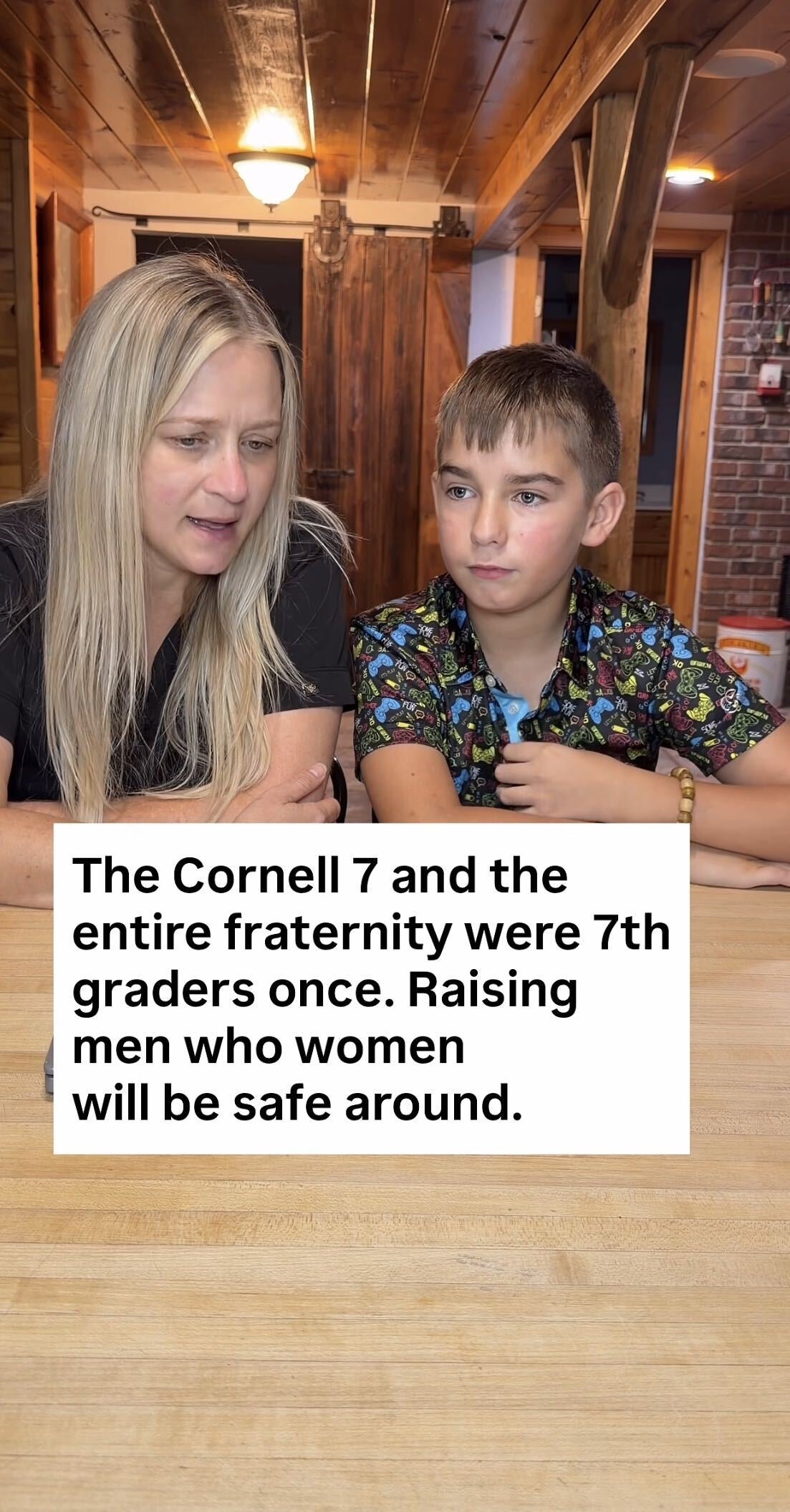 Woman and young boy sit together at a wooden table with text about the Cornell 7 and raising respectful men