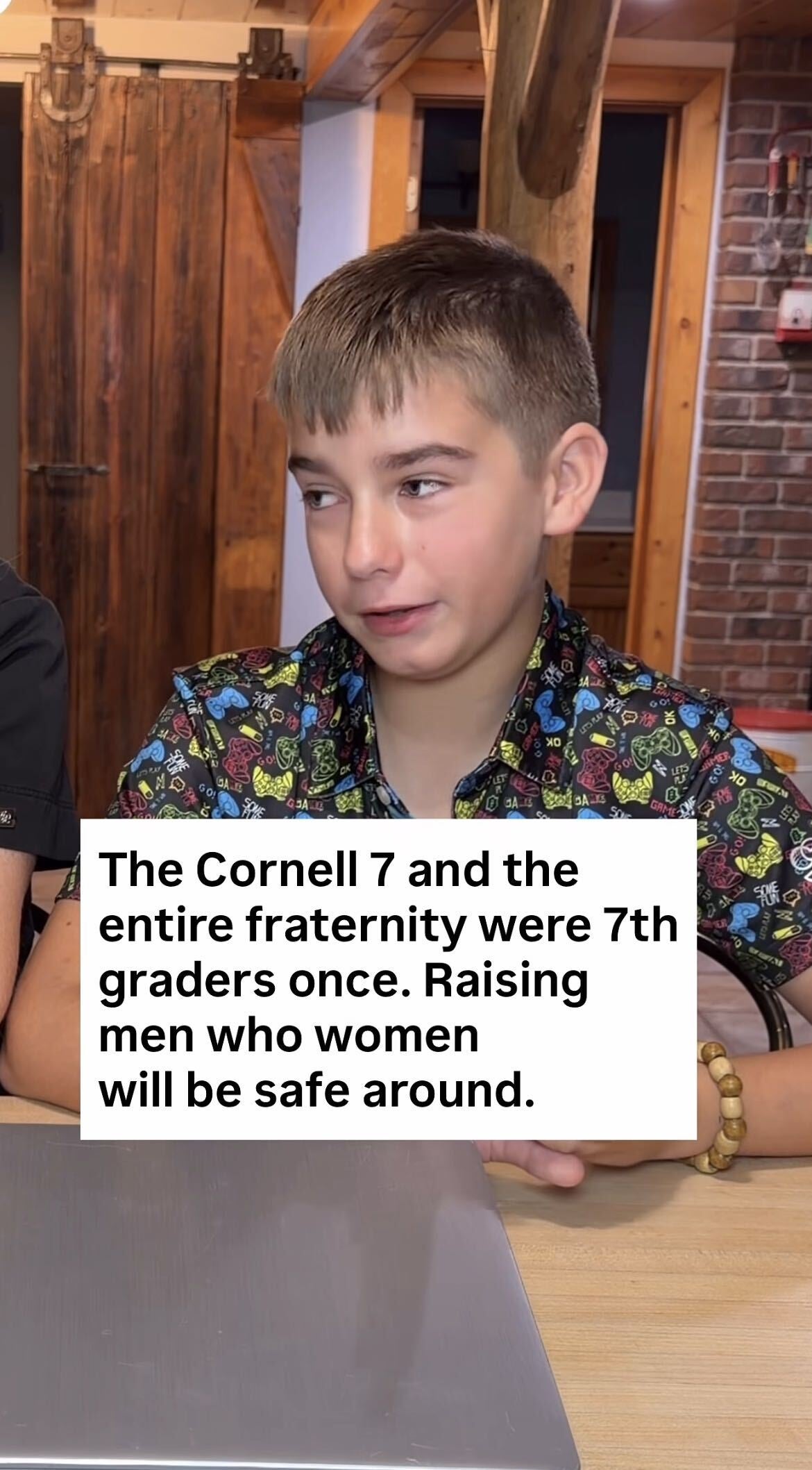 A young boy sits at a table wearing a patterned shirt. Text on the image discusses the Cornell 7, highlighting respectful upbringing
