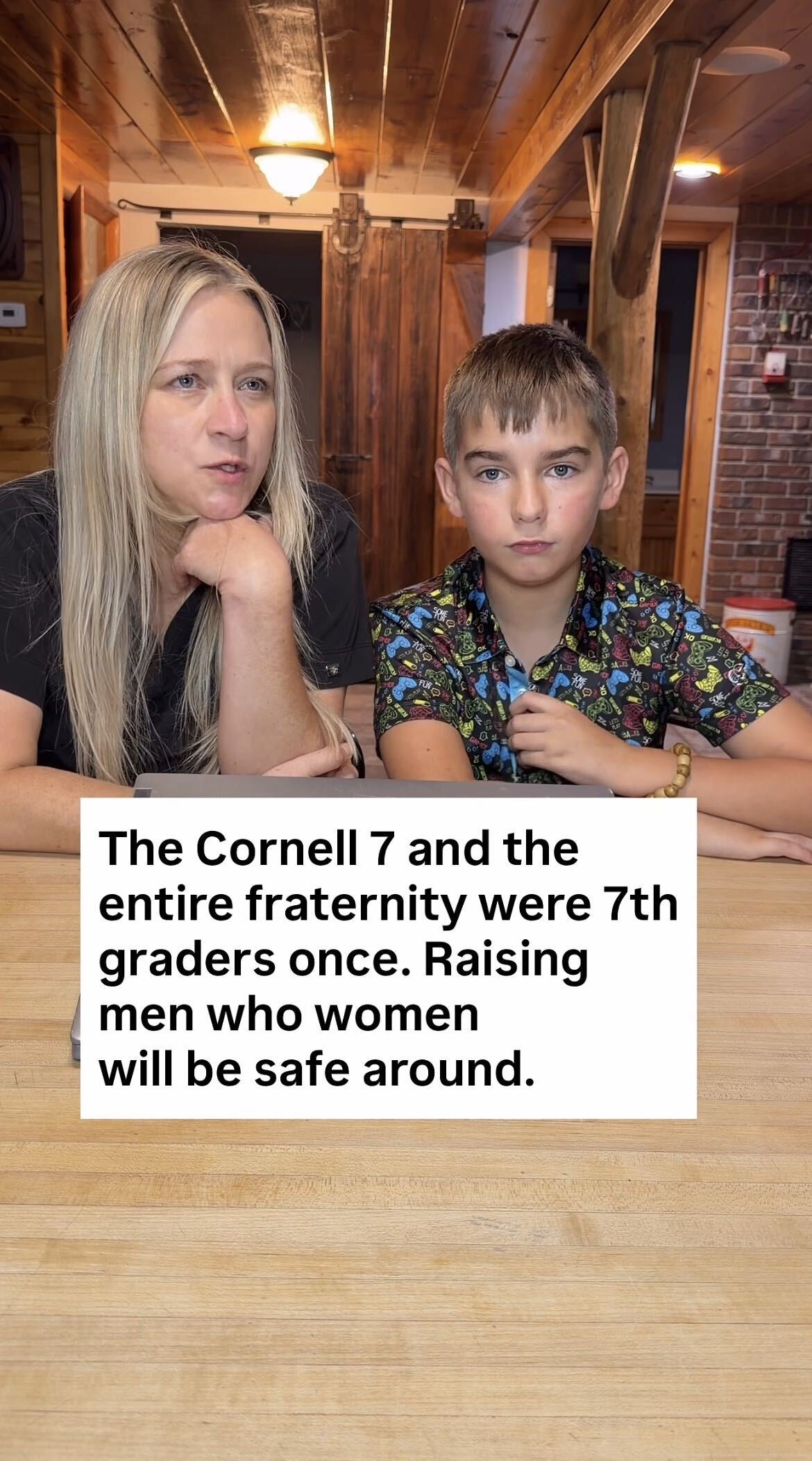 Woman and boy sitting at a table; text mentions "The Cornell 7" and raising respectful men