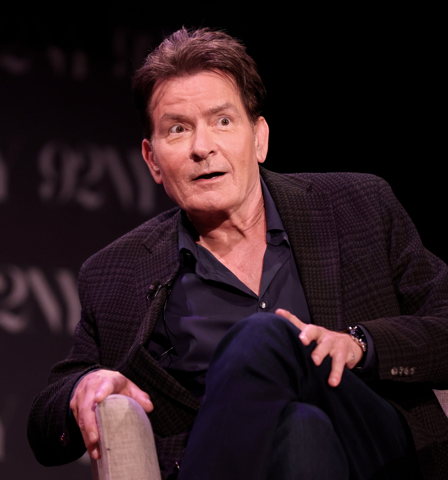 Charlie Sheen speaking connected  stage
