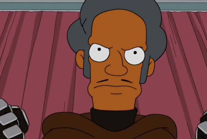 Apu with a stern expression, wearing futuristic gloves and lasting  successful  beforehand   of a curtain