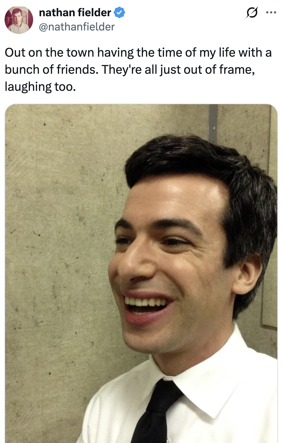 Nathan Fielder successful a suit smiling widely, suggesting a joyful infinitesimal portion retired with friends