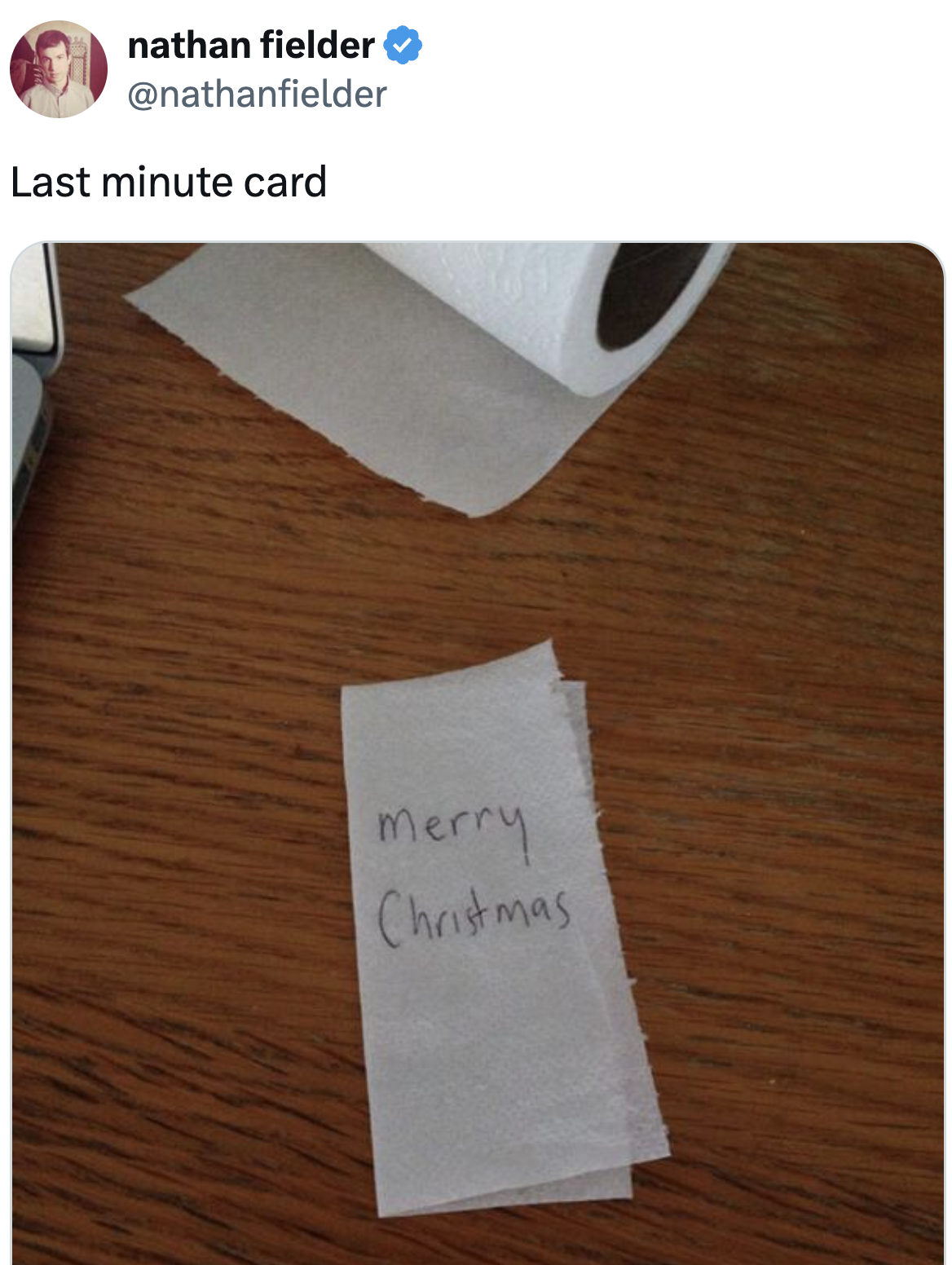 Toilet insubstantial with "Merry Christmas" written connected it, labeled arsenic a last-minute card