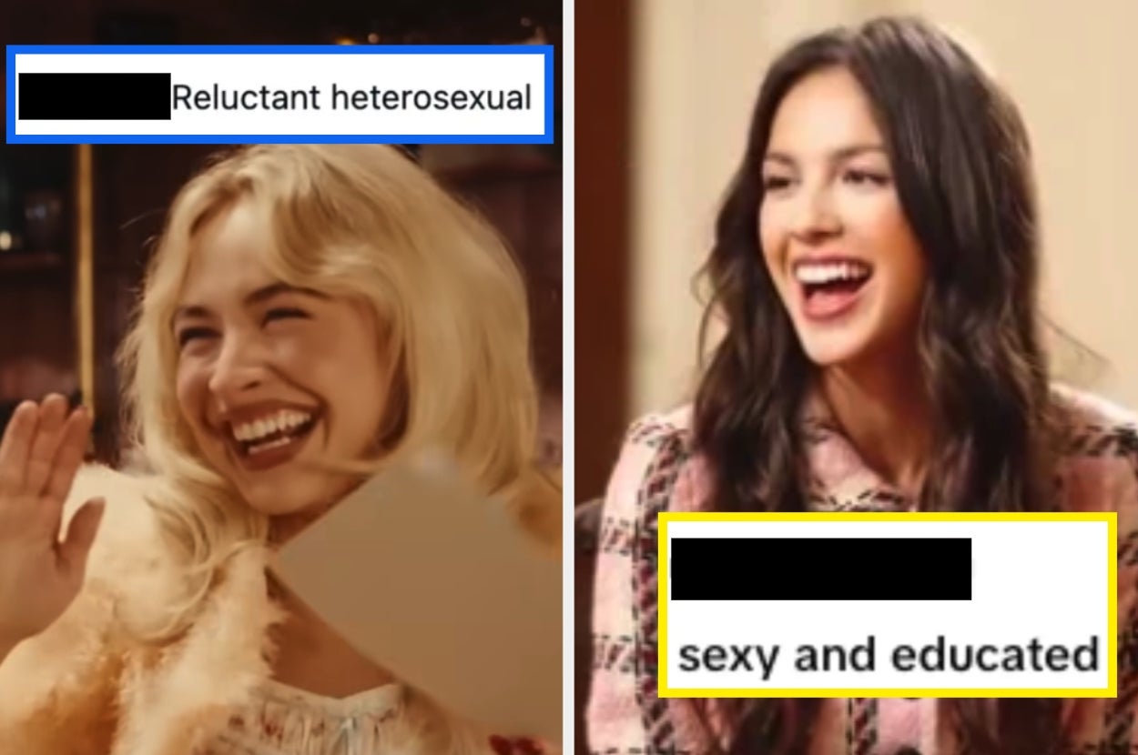 Two laughing women. Left, a blonde with a sign labeled "Reluctant heterosexual." Right, a brunette with a sign labeled "sexy and educated."