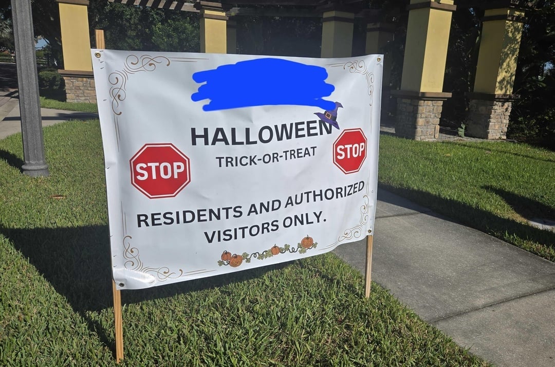 Halloween Trick-or-Treat motion   stating "Residents and Authorized Visitors Only" with halt  signs connected  some  sides