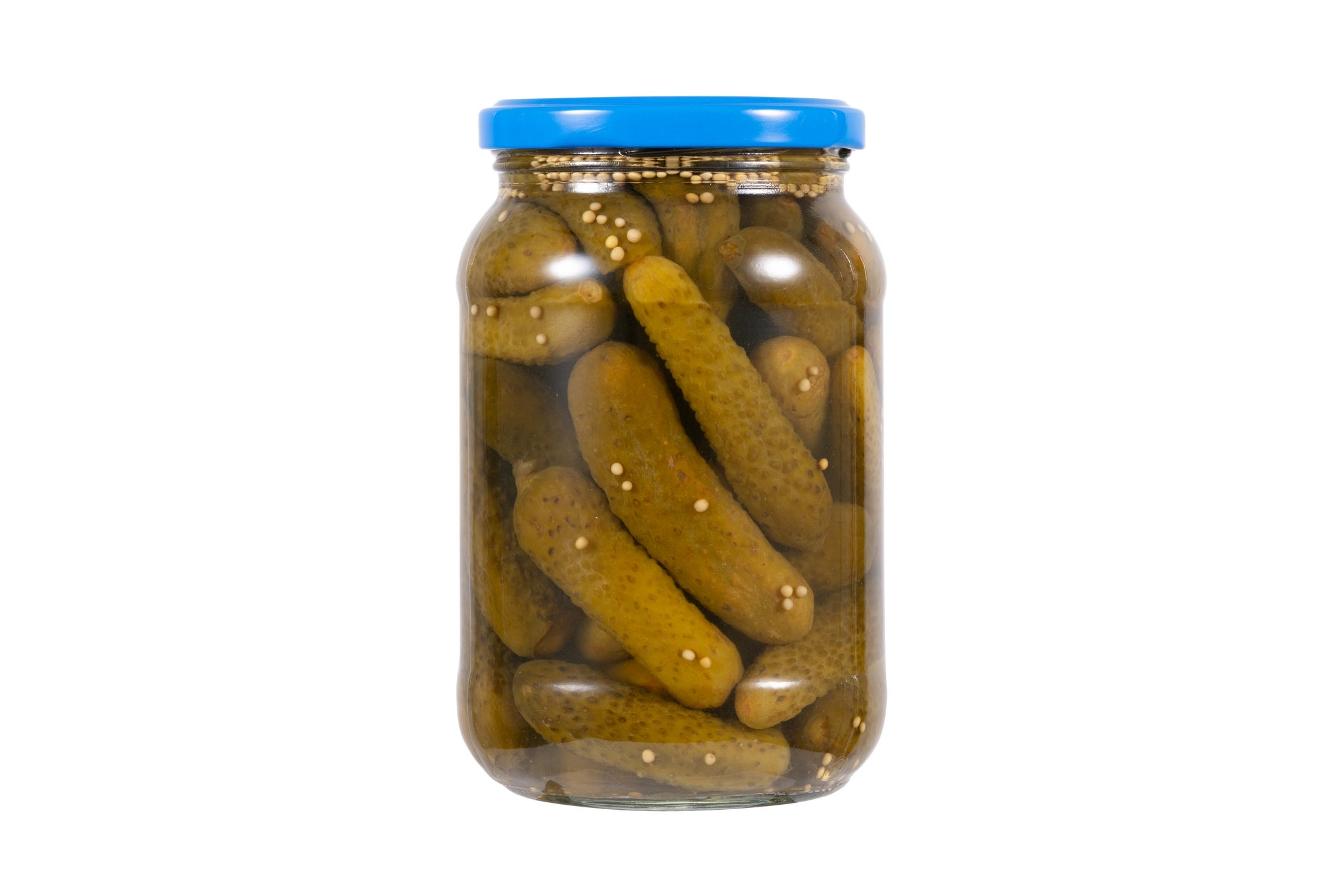 Jar of pickles with a blue lid, showing whole pickles submerged in brine inside the clear container