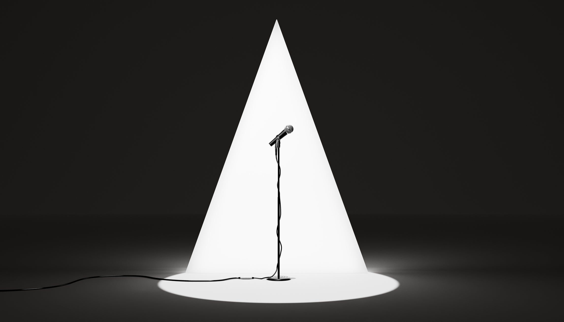 A solitary microphone stands nether  a spotlight, its cord trailing connected  the ground, symbolizing an bare  signifier    acceptable   for a performance