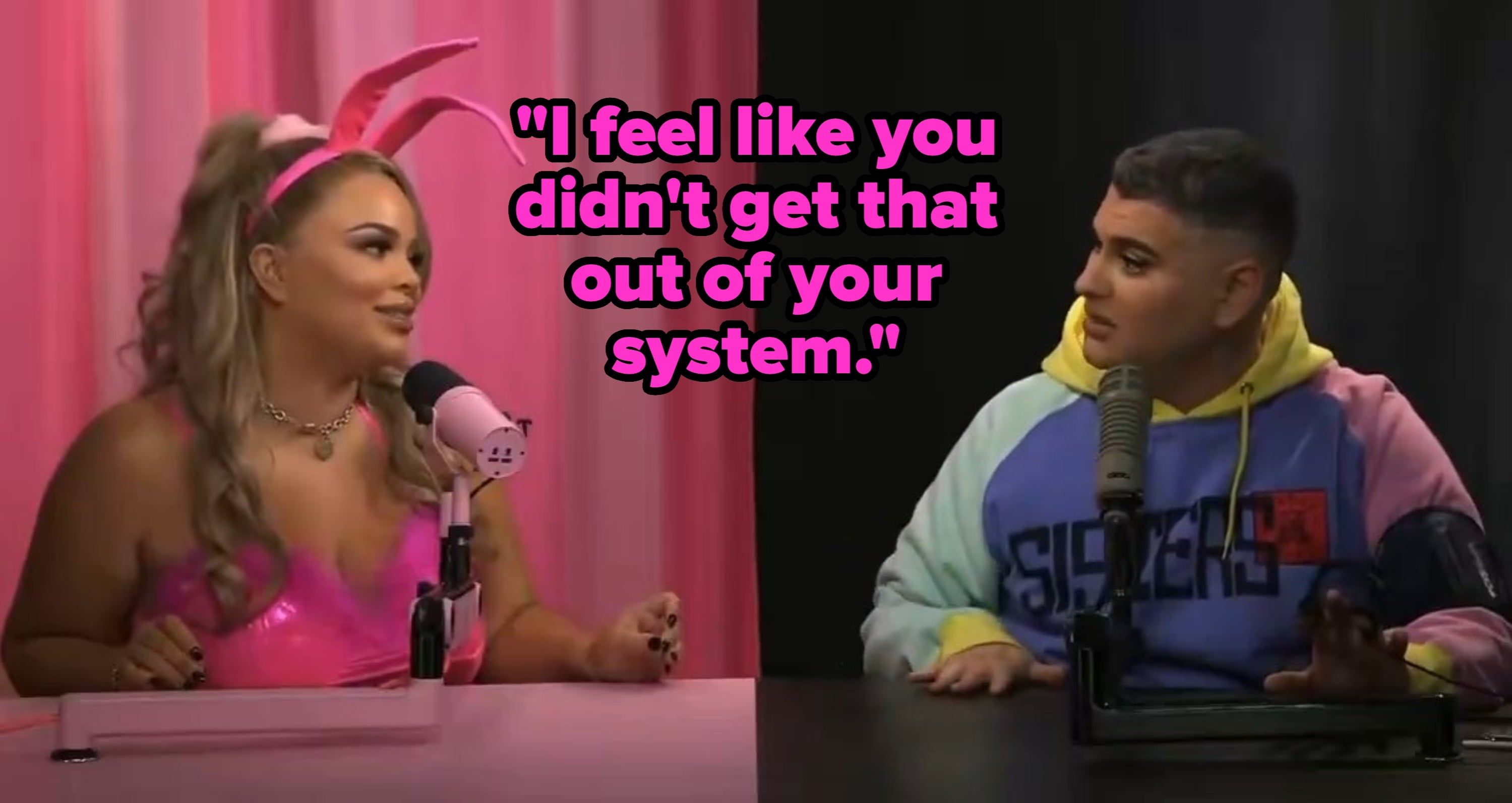 Trisha Paytas recording a podcast with Ethan Klein. She is wearing a playful headband and a vibrant outfit, while he wears a color-blocked hoodie and a face of