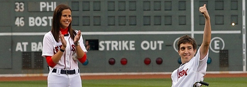 Marathon victim throws first pitch as Boston slowly heals