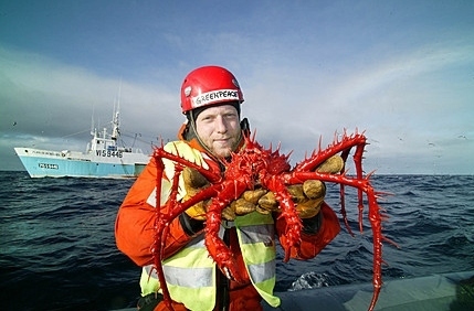 He's holding a giant crab