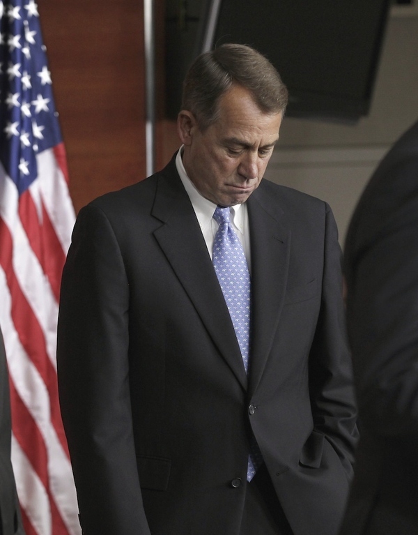 House Speaker John Boehner of Ohio, pauses as he and other Republican leaders talk to reporters a...