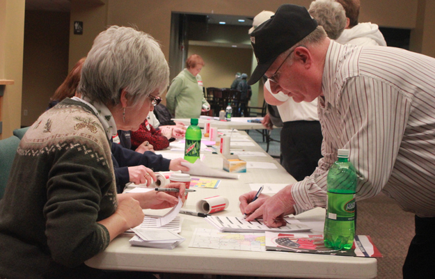 When people got there around 6ish they signed in at a table in front of the church.