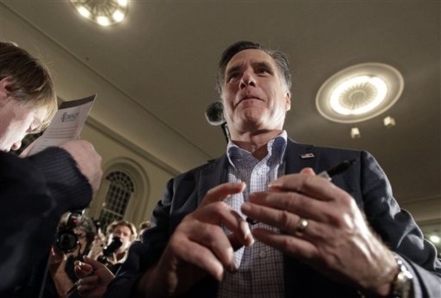 Republican presidential candidate, former Massachusetts Gov. Mitt Romney, who won the Iowa Caucuses by eight votes, campaigns during a town hall style meeting in Peterborough, N.H., Wednesday, Jan. 4, 2012.
