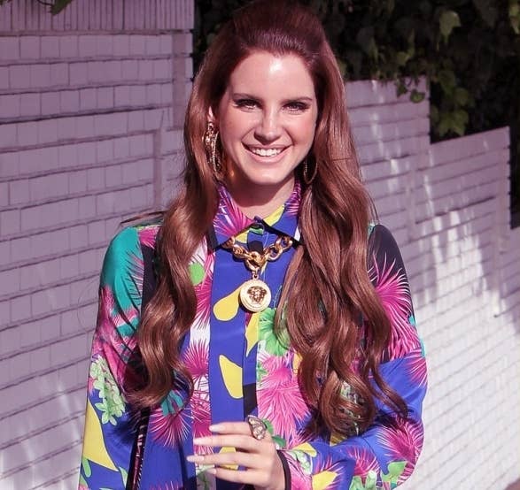 Lana Del Rey sporting a tropical pattern Versace shirt.