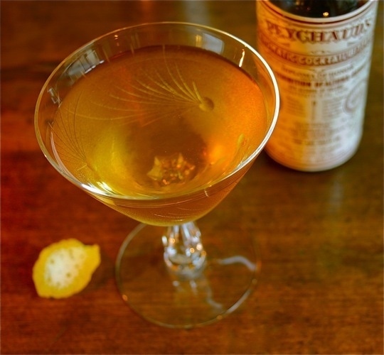 absinthe + rye whiskey + simple syrup + bitters + lemon peelGet the recipe from The Kitchn