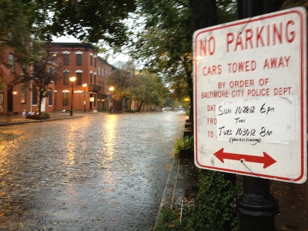 In Baltimore's Fells Point waterfront neighborhood, some streets near the harbor, normally filled with the cars of residents and visitors, are deserted Monday morning,