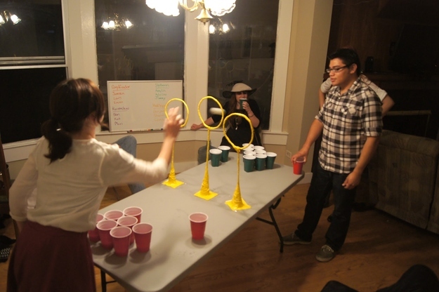 If the quaffle (ping pong ball) goes through a hoop and makes it in the cup it counts as two (much like if the ball were to bounce)