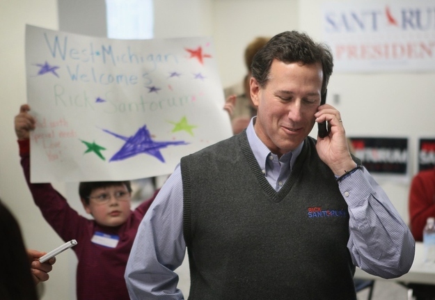 Rick Santorum calls a voter looking for support during a visit to his campaign office in Grand Rapids, Michigan.