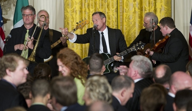 Maryland Governor Martin O'Malley (C), performs with his Celtic rock band O'Malley's March, during a St. Patrick's Day Reception hosted by US President Barack Obama for the visit of Irish Prime Minister Enda Kenny in the East Room of the White House in Washington, DC, March 20, 2012.