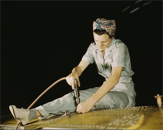 Unidentified woman drilling on a Liberator Bomber.