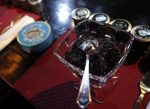 A cup with caviar is prepared for a competition which requires contestants to consume 500 grams of caviar in the fastest speed in Moscow, April 20, 2012. Alexander Valov, 49, won the contest.