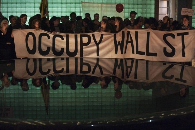 Demonstrators with the Occupy Wall Street movement participate in a rally at a park on May Day in New York, May 1, 2012.
