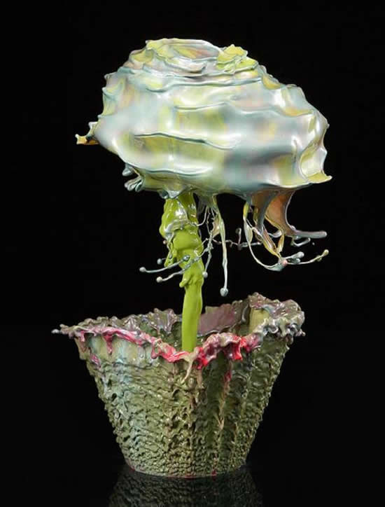 The clever artist uses water mixed with dyes, pigments and thickeners and as this cocktail is suspended in the air for just a split second, he takes high-speed photos hoping to capture the right moment. Jack won’t reveal the exact technique used to create his paint flowers, though.