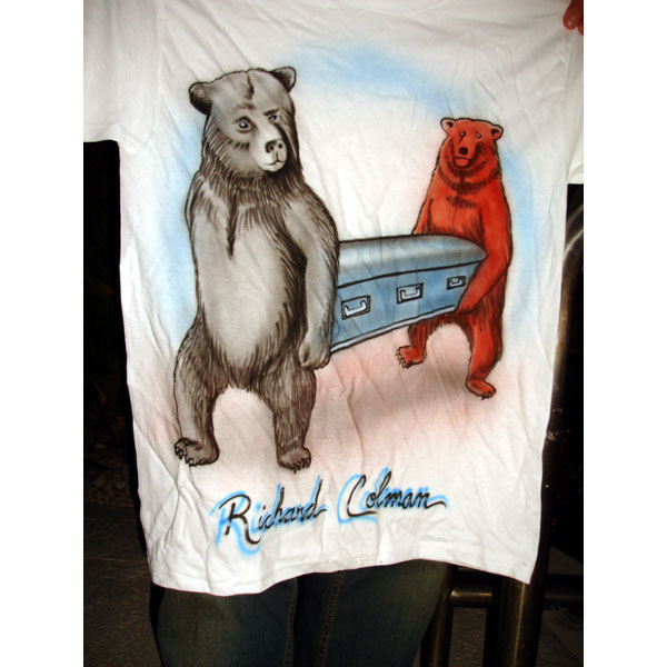 These two very droll bears stealing a casket.